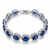 BRACELET TENNIS OVALE SAPHIR BLEU MONTURE TORSADÉE | ARGENT