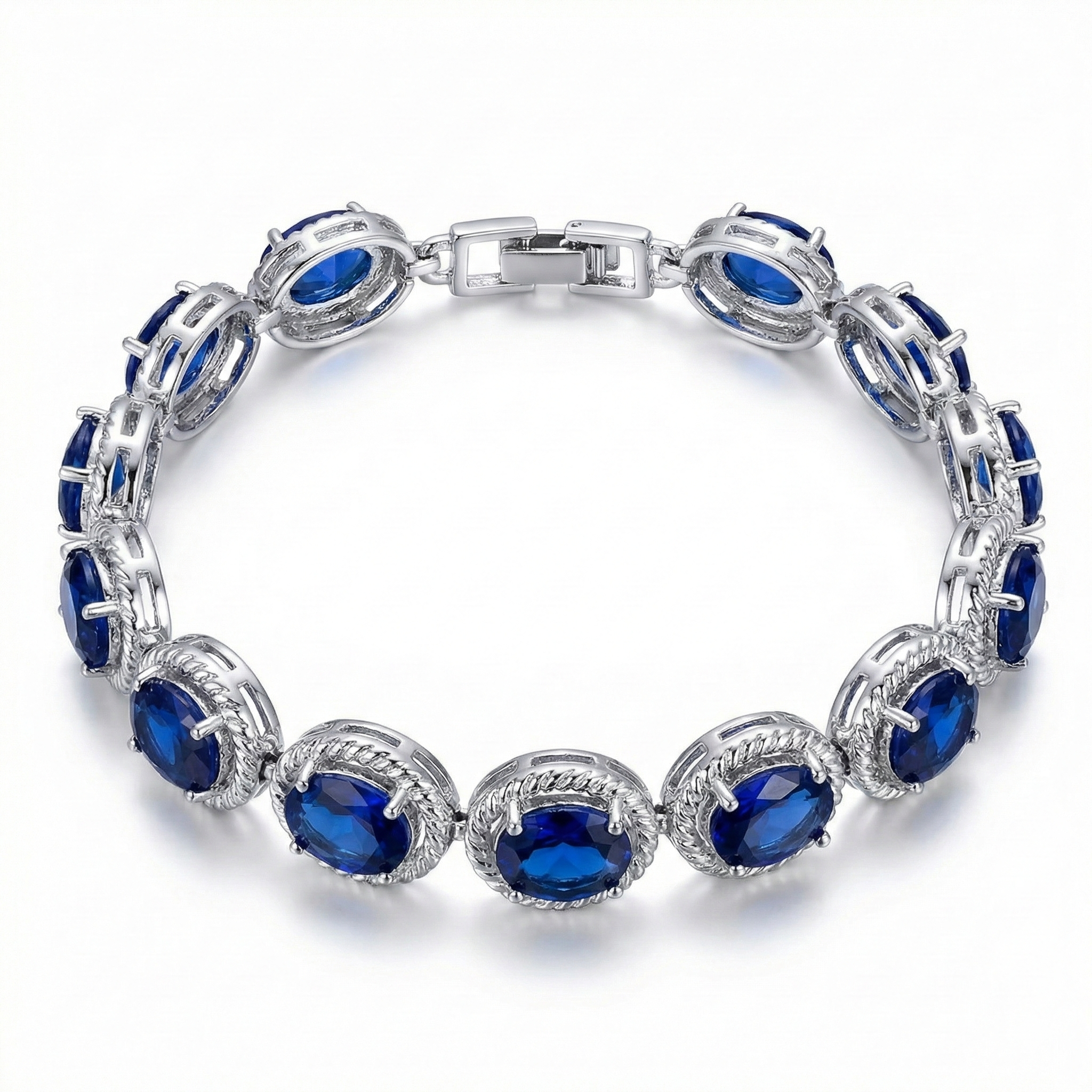 BRACELET TENNIS OVALE SAPHIR BLEU MONTURE TORSADÉE | ARGENT