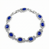 BRACELET TENNIS FLEURS OVALES SAPHIR BLEU HALO PAVÉ | ARGENT