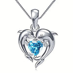 COLLIER PENDENTIF DAUPHINS JUMEAUX CŒUR TOPAZE BLEUE | ARGENT