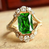 ANILLO CÓCTEL ESMERALDA RECTANGULAR HALO PAVÉ VINTAGE | ORO