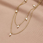 COLLIER PERLE GOUTTE SUPERPOSÉ