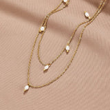 COLLIER PERLE GOUTTE SUPERPOSÉ