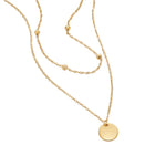 COLLIER SUPERPOSÉ DISQUE