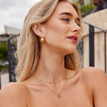 COLLIER SUPERPOSÉ DISQUE
