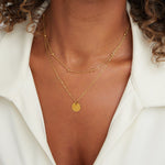 COLLIER SUPERPOSÉ DISQUE